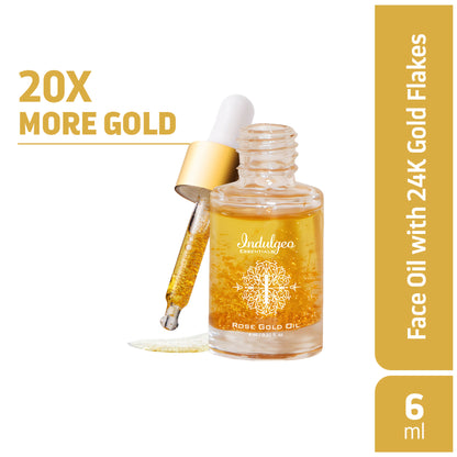 Indulgeo Essentials 24k Rose Gold Face Primer Oil showing a clear glass bottle with a dropper and a gold-colored oil inside.