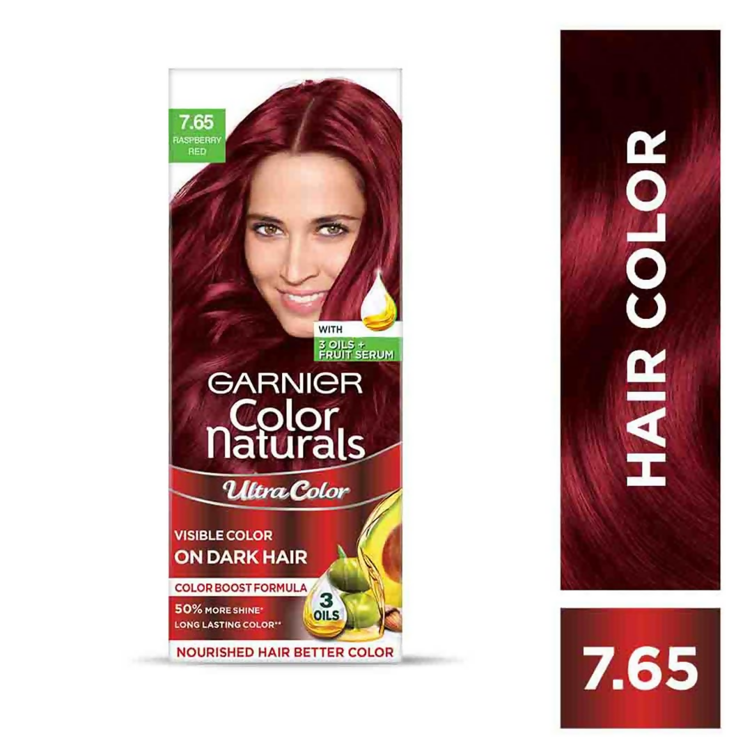 Garnier Color Naturals Ultra Hair Color in 7.65 Raspberry Red showcasing vibrant red hair dye in a tube.