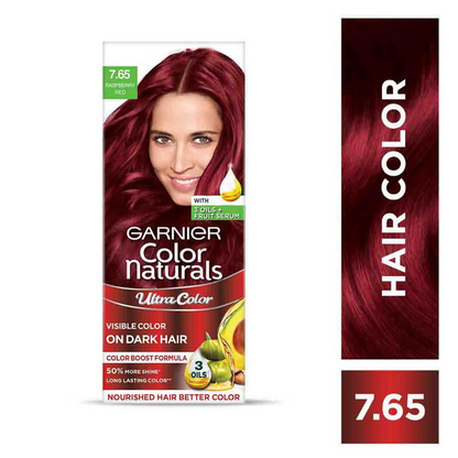 Garnier Color Naturals Ultra Hair Color in 7.65 Raspberry Red showcasing vibrant red hair dye in a tube.