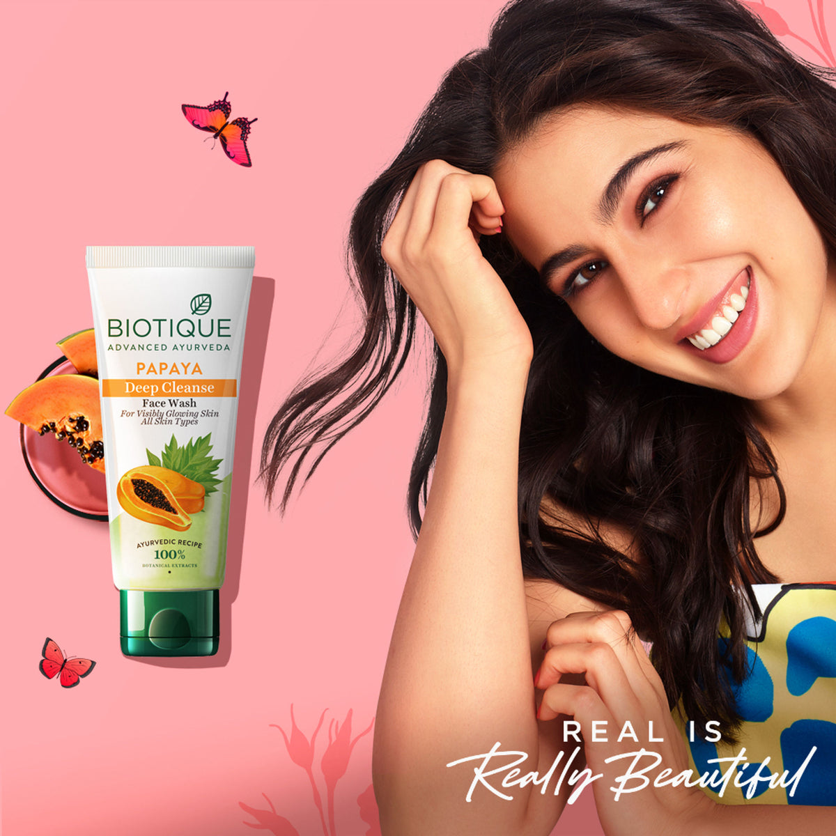 Biotique Bio Papaya Face Wash for all skin types showing the tube with papaya extract and facial foam on a white background.