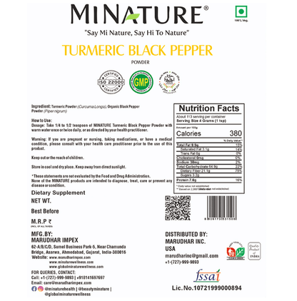 Minature organic turmeric and black pepper Ayurvedic powder in a small jar, highlighting vibrant turmeric and black pepper particles.