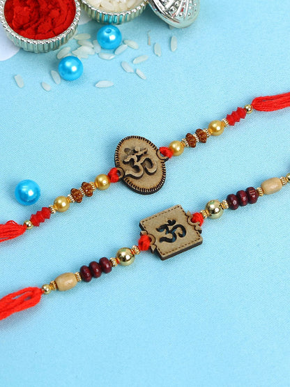 Anouk Set Of 2 Red Wooden Om Beaded Rakhi With Roli Rice & Greeting Card