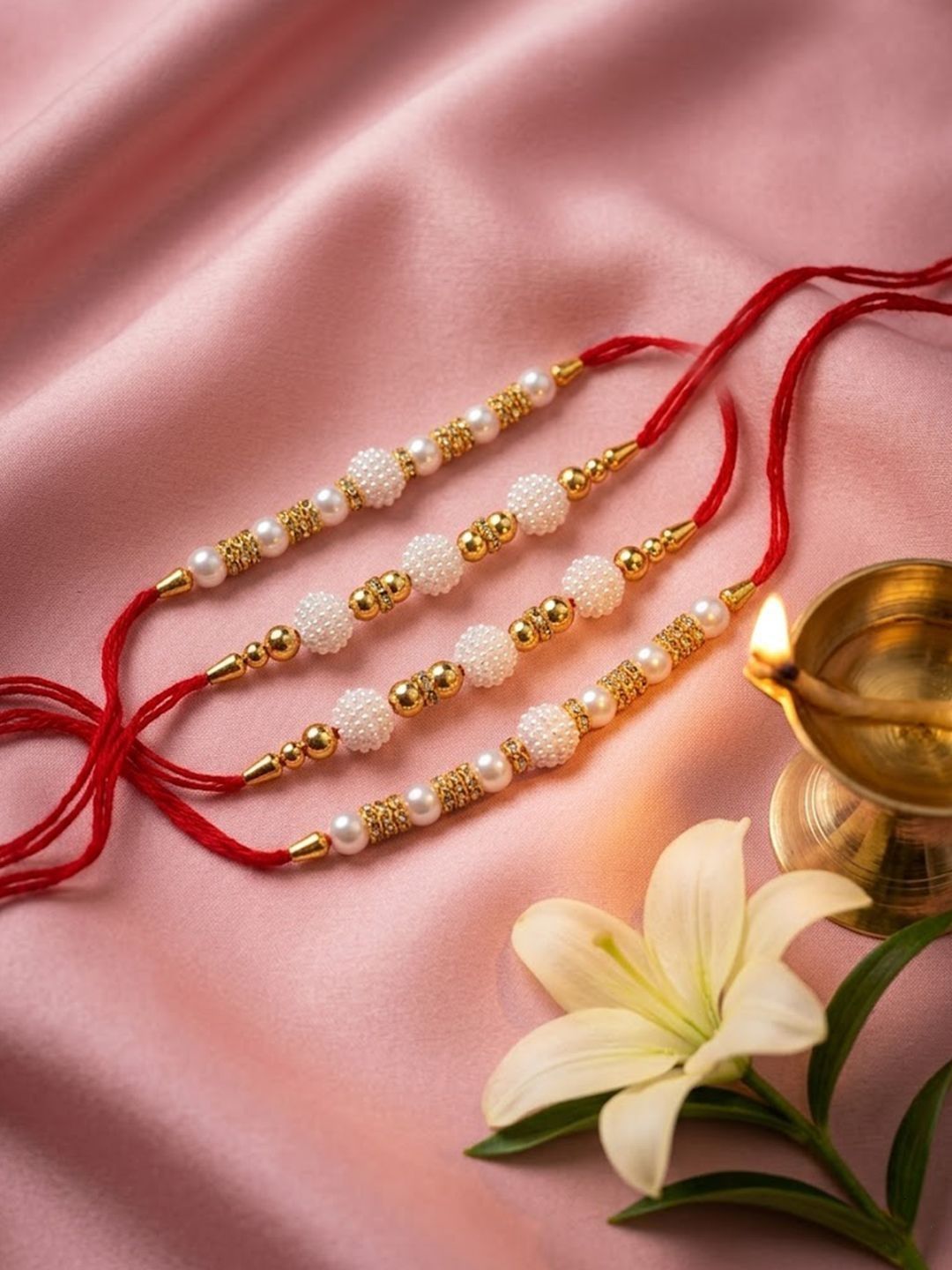 Anouk Set Of 4 White Pearls & Red Thread Rakhi With Roli Chawal Chandan Mishri