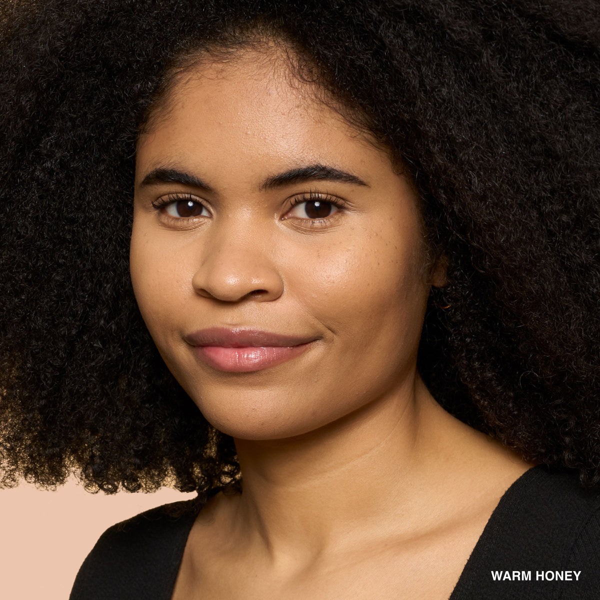 Bobbi Brown Weightless Skin Natural Matte Finish Foundation SPF 15 in Warm Honey, showcasing the foundation bottle with applicator.