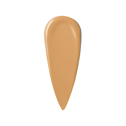 Bobbi Brown Mini Weightless Skin foundation in Warm Honey with natural matte finish and SPF 15, showing the compact container.