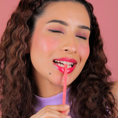 La Mior Only For You Adaptive Lip Tint in Strawberry Punk shade, featuring a vibrant pink-red lip color on natural lips.