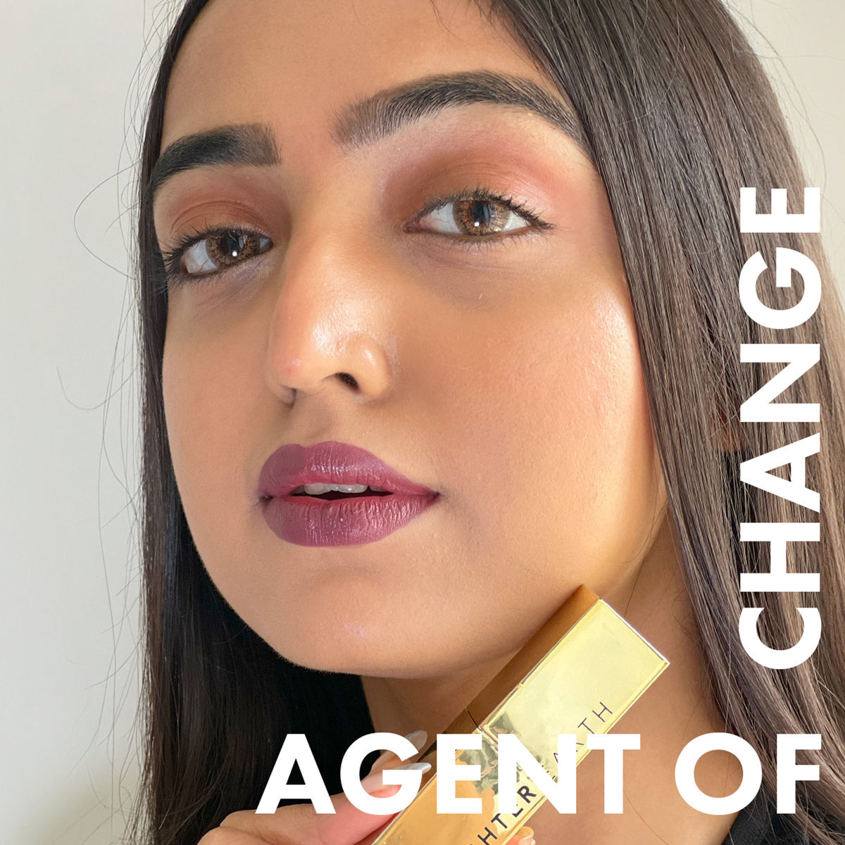 Daughter Earth Natural & Creamy Velvet Phytonutrient Lipstick in Agent Of Change, showing a close-up of the lipstick bullet with creamy texture.