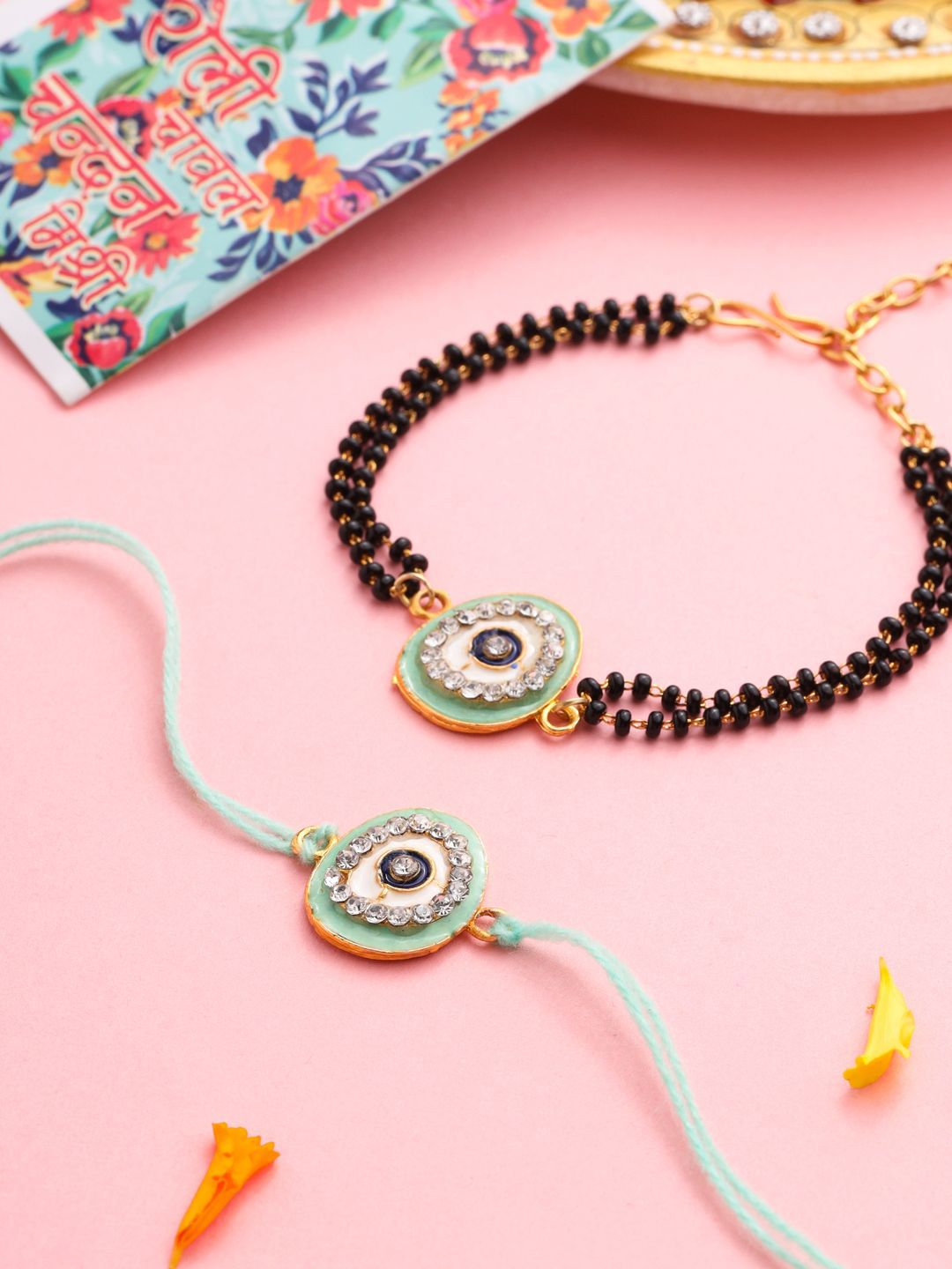 Anouk Set Of 2 Green Round Shape Artificial Stones Bhaiya Bhabhi Rakhi With Roli Chawal