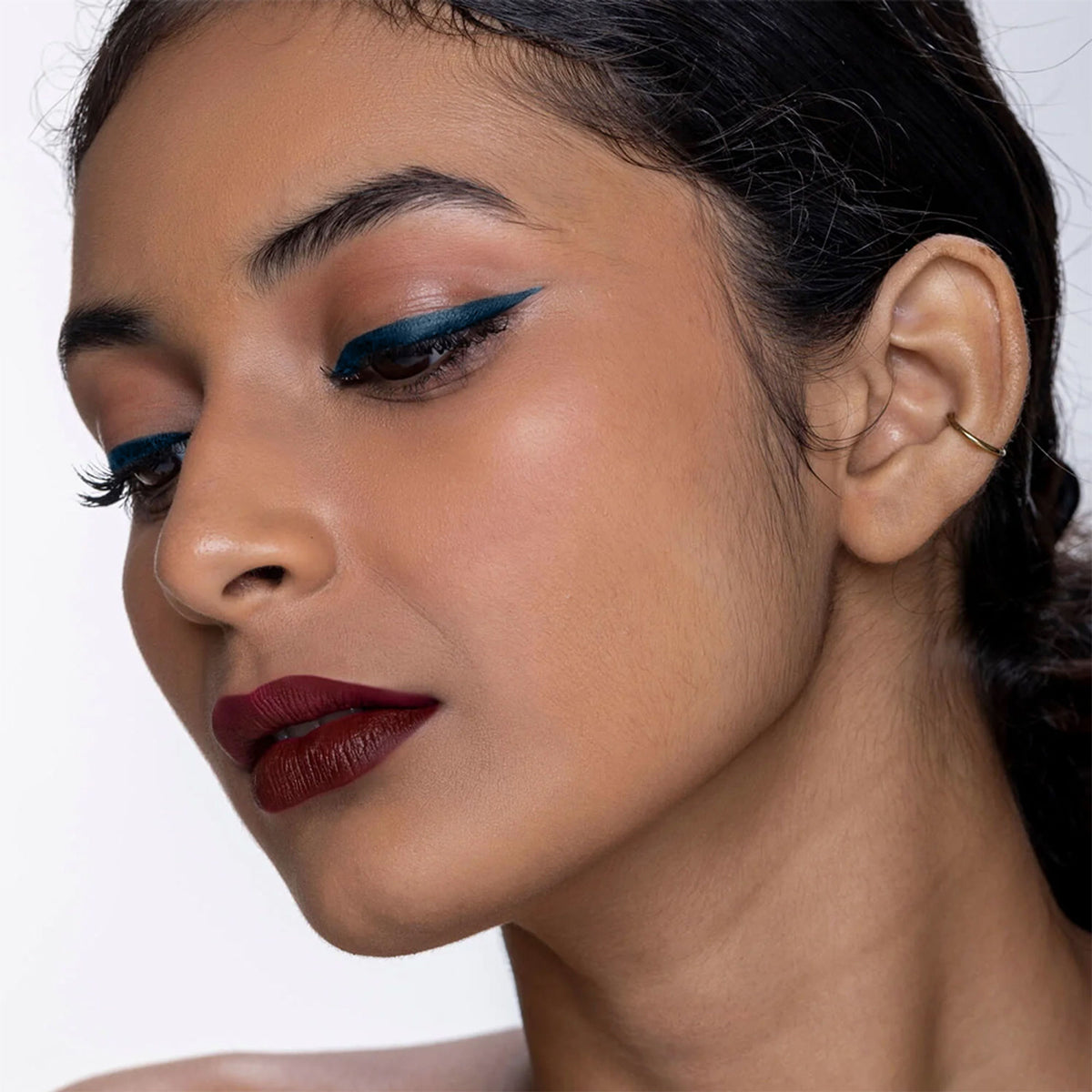 KIRO Waterproof Soft-Matte Eyeliner Pen in Azure Blue, showing the pen's sleek design and vibrant blue ink tip.