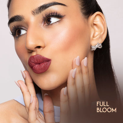 Nykaa Cosmetics Bridgerton Creamy Matte Longwear Lipstick in Full Bloom shade, showcasing a smooth, vibrant lipstick bullet.