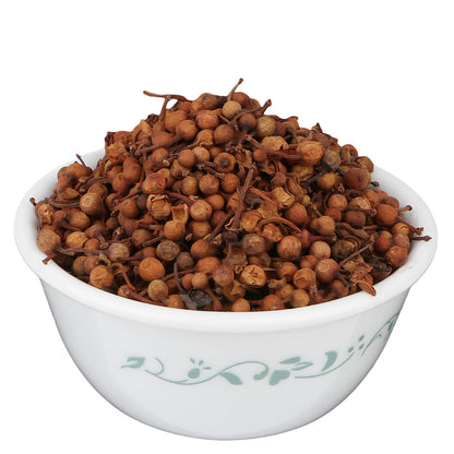 Yuvika Nagkesar (Ochrocarpus Longifolius) Ayurvedic herb in a glass jar, showcasing the traditional saffron spice and herbal roots.