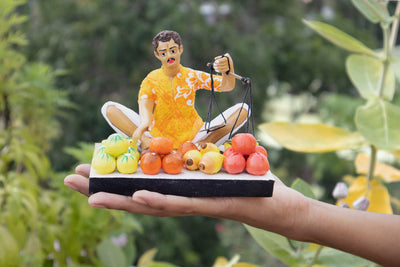 Niharika Collections Krishnanagar Handmade Clay Gift & Décor | Basic- Sitting Human Figure Miniature Idol - Fruit Seller