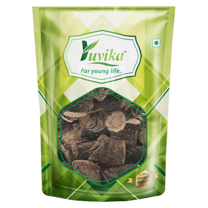 Yuvika Musli Kali Curculigo Orchiodes Gaertn Ayurvedic supplement in a glass jar with dried root powder and label.