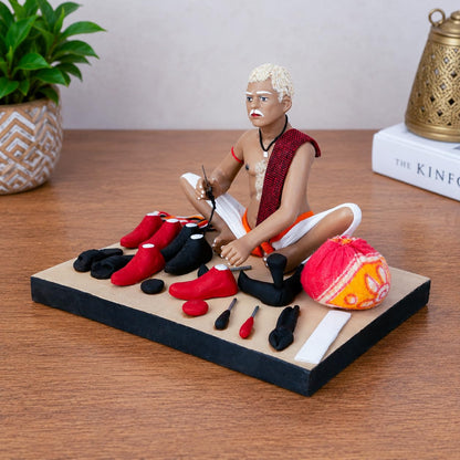 Niharika Collections Krishnanagar Handmade Clay Brick Breaker Idol, Sitting Human Figure Miniature,Handcrafted Indian Art,Multicolour Home Décor, Golu Display & Gifting-15.2 x 10.2 x 10.2 cm