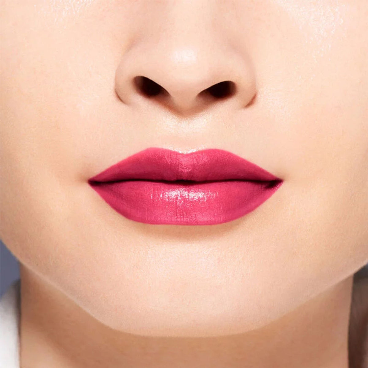 Shiseido VisionAiry Gel Lipstick in shade 214 Pink Flash, showcasing smooth gel formula and vibrant pink color on the lipstick tube