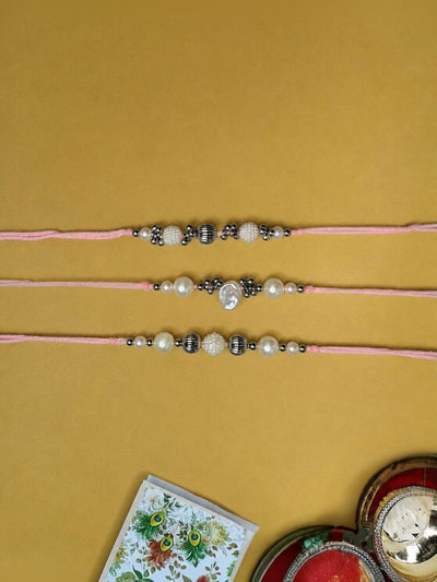 Indyancart Set Of 3 White Pearls Thread Rakhi With Roli Chawal Chandan Mishri