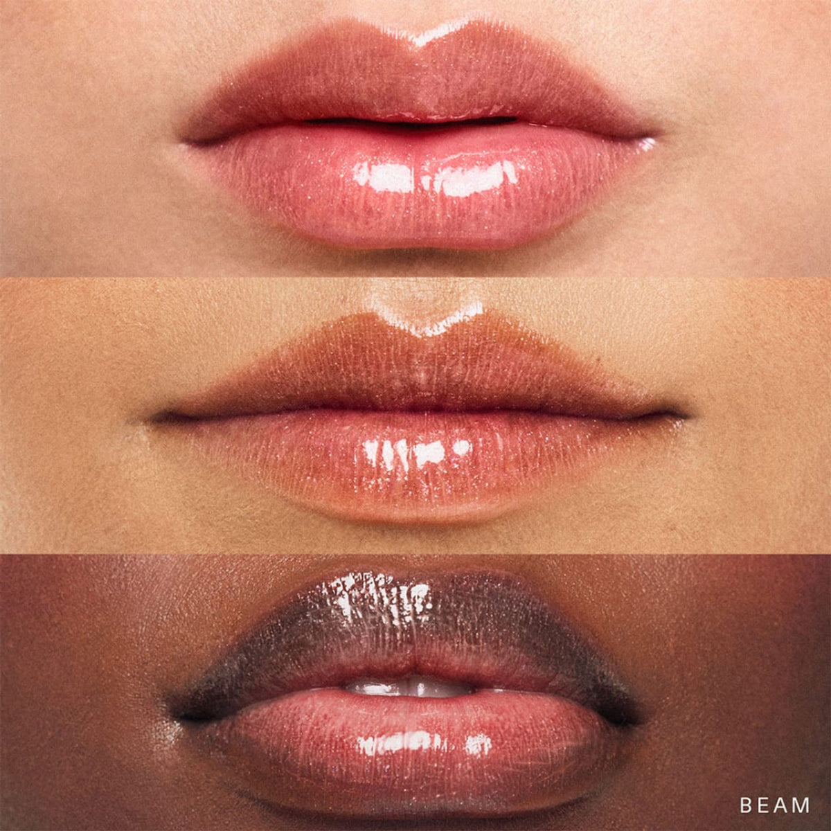 Rare Beauty Positive Light Luminizing Lip Gloss in Beam, clear tube showing glossy, shimmering lip gloss with subtle shine and branding.