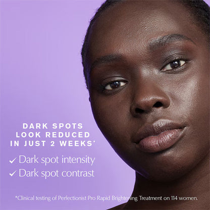 Estee Lauder Perfectionist Pro Rapid Brightening Treatment bottle with pump and sleek packaging on a white background.