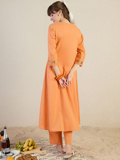 Women Floral Embroidered Cotton Kurta with Trousers