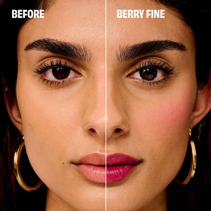 Benefit Cosmetics Benetint lip and cheek tint in Raspberry, showcasing the small glass bottle with rose tint liquid.