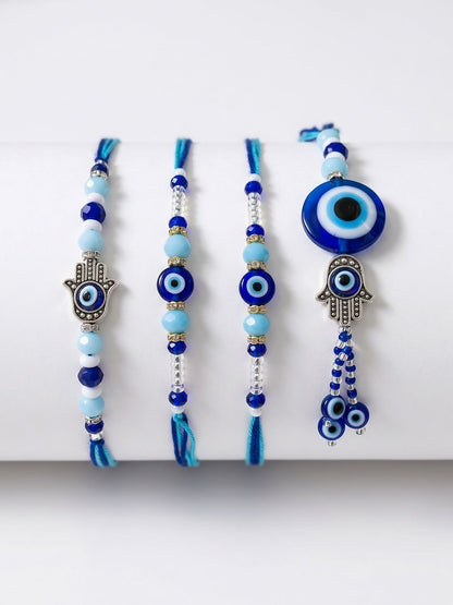 Anouk Set Of 4 Designer Blue Evil Eye Thread Rakhi With Roli Chawal Chandan Mishri