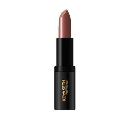 Keya Seth Aromatherapy professional matte lipstick in Light Bright Nude, showing the smooth nude lipstick bullet in a natural setting