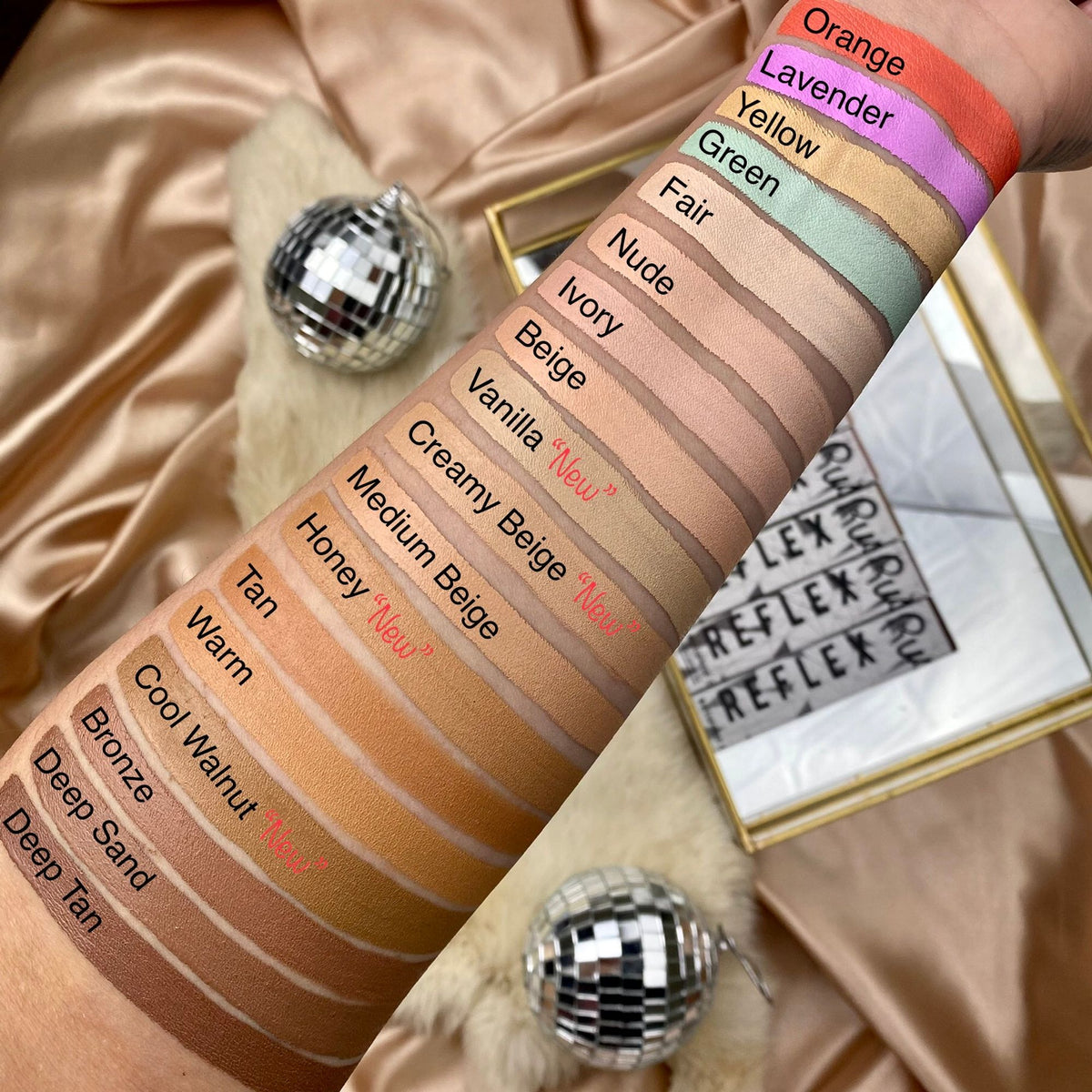 Rude Cosmetics Reflex Waterproof Concealer in Honey 08, showing a close-up of the creamy concealer tube with a beige shade.