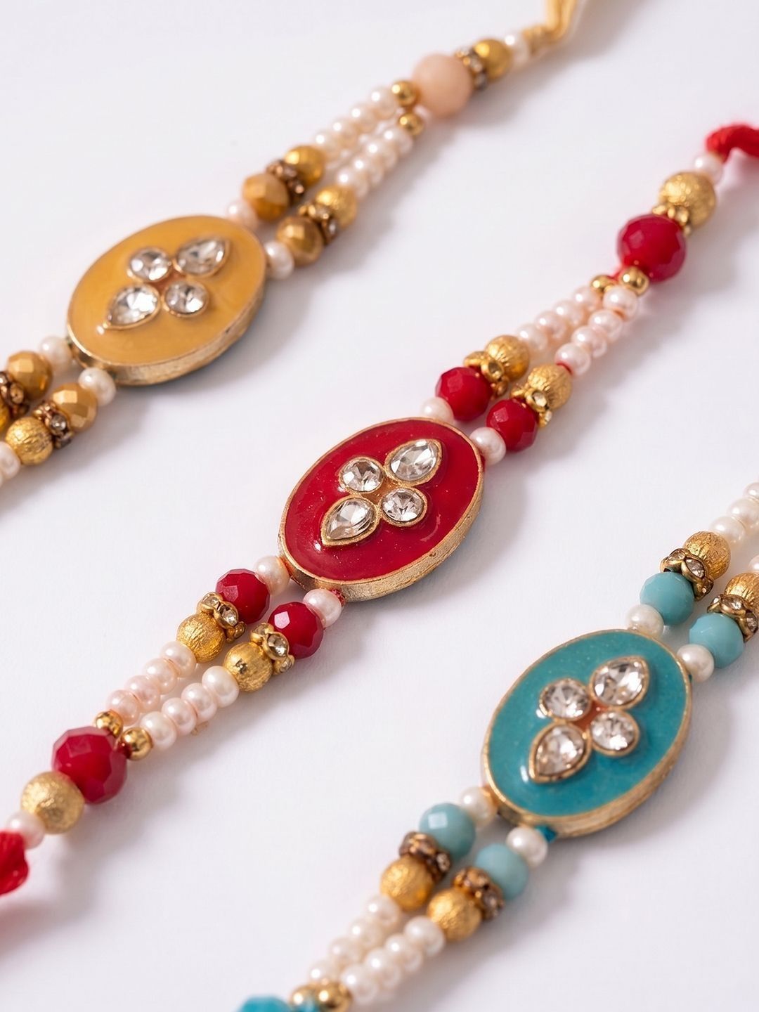 Anouk Set Of 3 Multicolor Artificial Beads & White Pearls Thread Rakhi With Roli Chawal