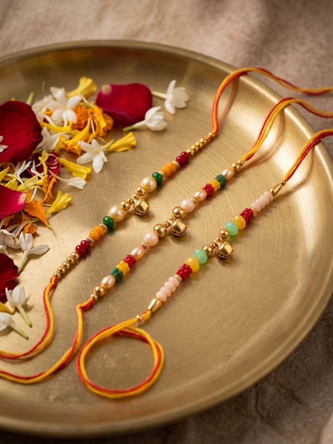 Anouk Set Of 3 Artificial Beads Orange Thread Rakhi With Roli Chawal Chandan Mishri