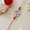 Dhiyona Gold Toned American Diamond Stone Studded Rakhi With Roli Chawal & Greeting Card