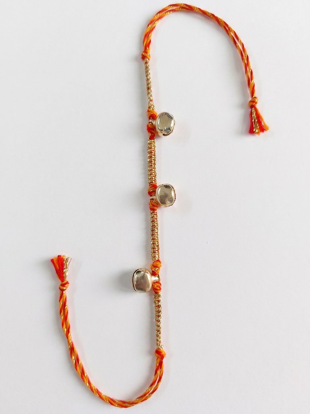 Anouk Golden Ghungroo Thread Rakhi With Roli Chawal Chandan Mishri