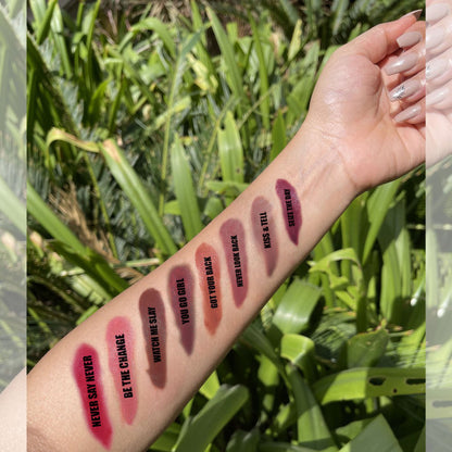 Love Earth multipot lip and cheek tint in a compact container with a natural pink shade and a smooth, creamy texture.