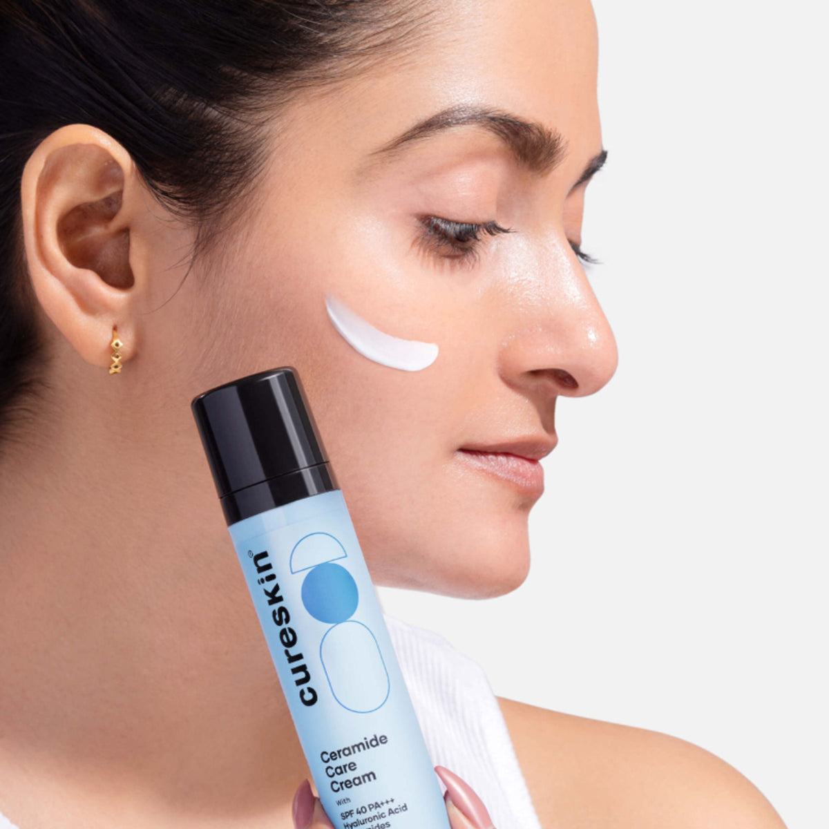 Cureskin Ceramide Care Cream SPF 40 PA+++ moisturizer with anti-aging and skin barrier strengthening properties, in a jar.