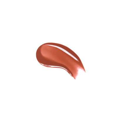 Huda Beauty Faux Filler Extra Shine Lip Gloss in Foxy, showcasing a glossy nude lip look with smooth, shiny finish.