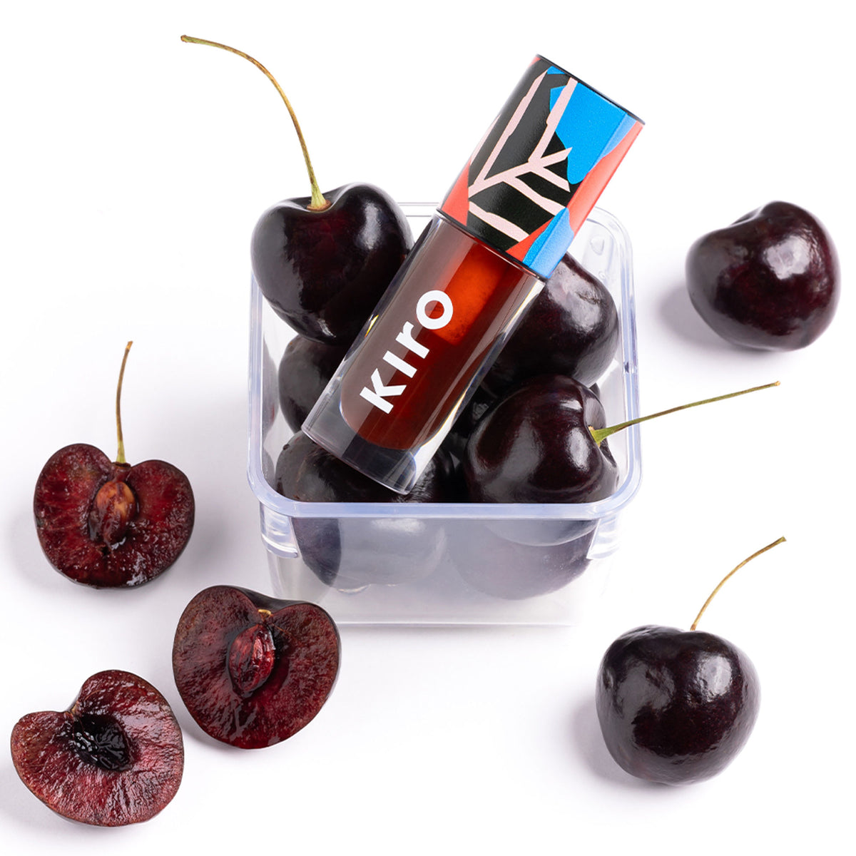 KIRO Ph Play Lip & Cheek Oil in Truffle Drip, featuring a sleek bottle with a dropper applicator and rich, glossy liquid.