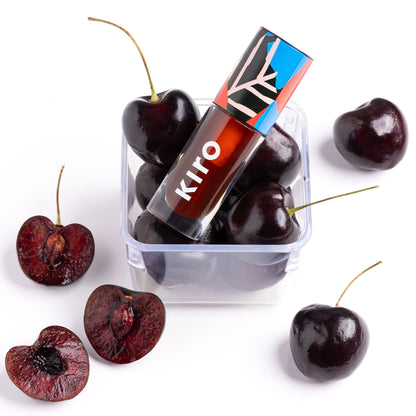 KIRO Ph Play Lip & Cheek Oil in Truffle Drip, featuring a sleek bottle with a dropper applicator and rich, glossy liquid.