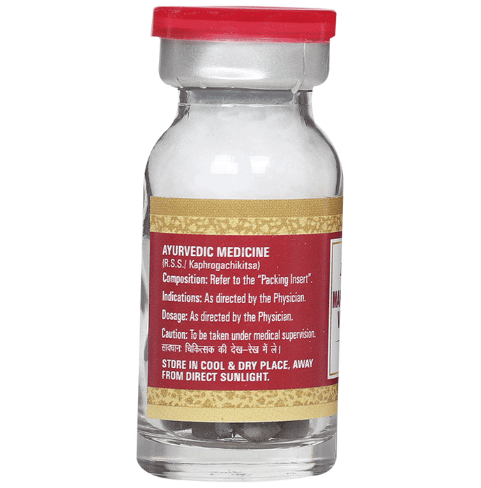 Multani Mahalaxmi Vilas Ras Ayurvedic tablets with gold, traditional herbal medicine, in a clear container.