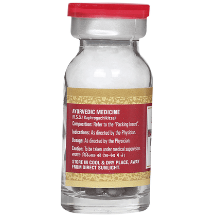 Multani Mahalaxmi Vilas Ras Ayurvedic tablets with gold, traditional herbal medicine, in a clear container.