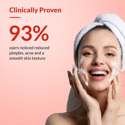 Fixderma Strawberry Face Wash with Vitamin E and strawberry extract for oily skin, showing the product bottle and fresh strawberries.