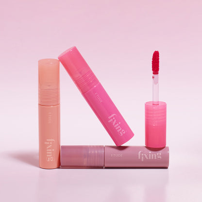 ETUDE Glow Fixing Tint Mini in shade 05 Mauvement, close-up of the small lip tint tube with vibrant mauve color.