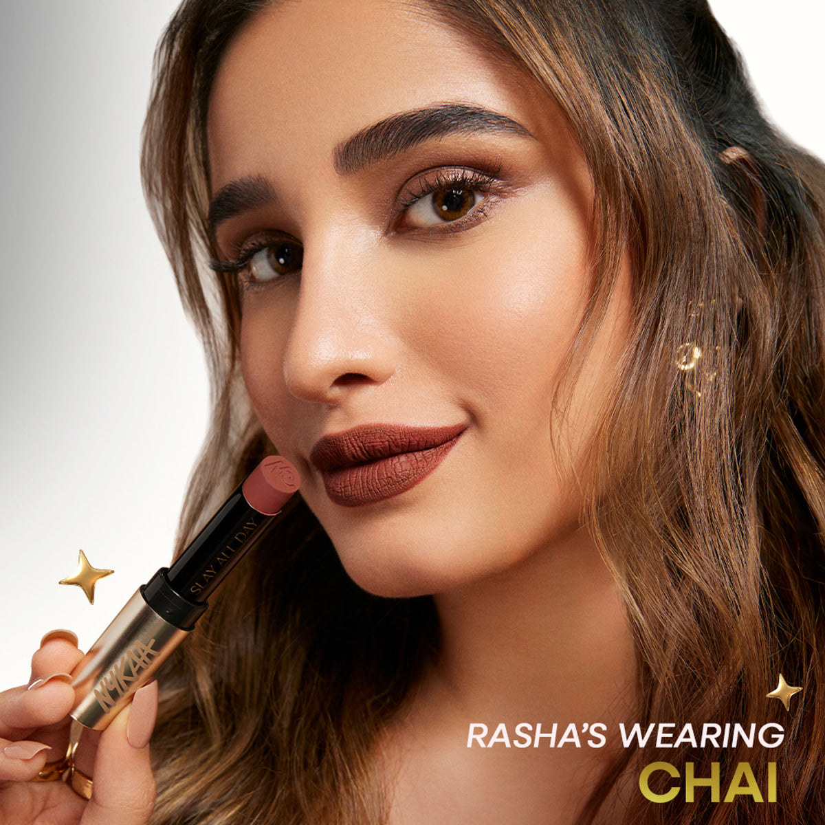 Nykaa Matte to Last No Transfer Long Lasting Lipstick in Chai, showing the rich nude lipstick swatch on lips.