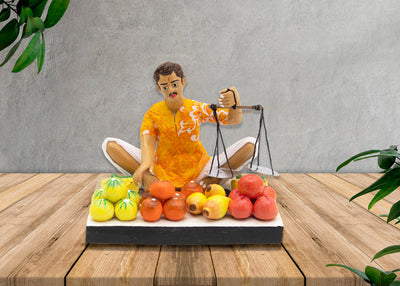 Niharika Collections Krishnanagar Handmade Clay Gift & Décor | Basic- Sitting Human Figure Miniature Idol - Fruit Seller