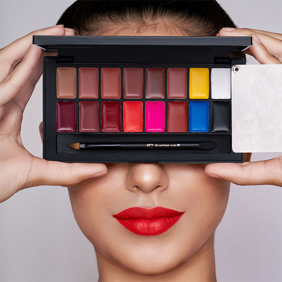 Europe Girl Kiss Me Lip Palette featuring a variety of colorful lip shades in a sleek compact.