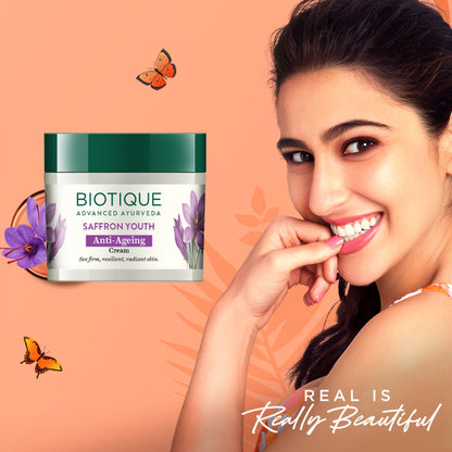Biotique Saffron Youth Anti-Ageing Cream jar showcasing the product's packaging with saffron infusion for youthful skin.