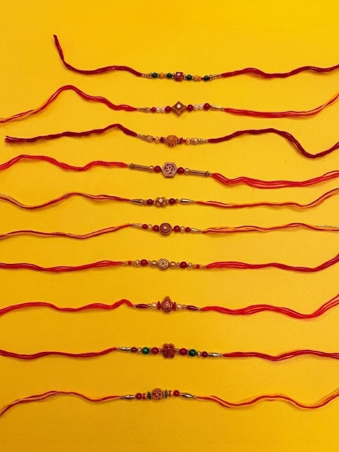 Anouk Set Of 10 Multicolor Designer Thread Rakhi With Roli Chawal Chandan Mishri