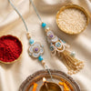Dhiyona Set Of 2 Pearls & Artificial Stones Floral Bhaiya Bhabhi Rakhi With Roli Chawal