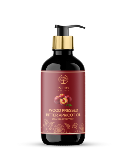 Ivory Natural pressed bitter apricot oil in a glass bottle, natural and organic hair oil for deep moisturization and gentle hydration.