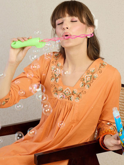 Women Floral Embroidered Cotton Kurta with Trousers
