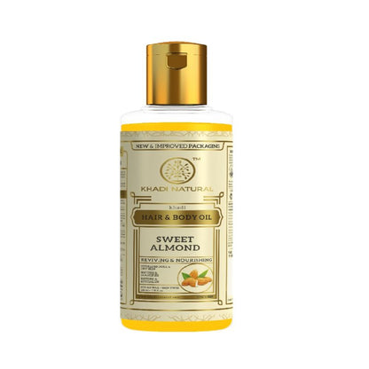 Khadi Natural Sweet Almond Hair & Body Oil bottle with almond illustration, designed to hydrate dry skin and nourish hair.