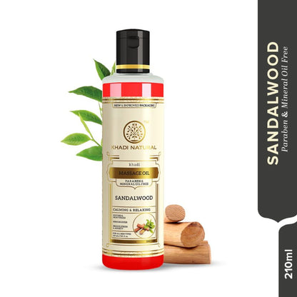 Khadi Natural Sandalwood Massage Oil in a clear glass bottle, free from parabens and mineral oils, with sandalwood scent.